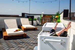 Picture yourself enjoying a nice glass of wine on a private rooftop!