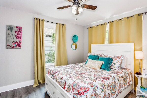 Lovely queen bedroom with under bed storage