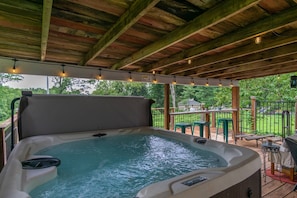 Hot tub features cool LED lights for you to enjoy at night! Grab a drink and have some fun!