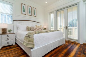 Spacious Master Bedroom with King Bed, Boasts Natural Sunlight with a Private balcony overlooking Lake Caroline