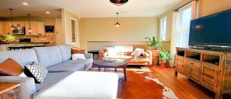 Upstairs living room - open floor plan to kitchen and dining room