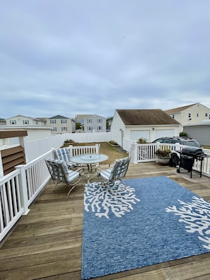 Large deck with spacious fenced in yard