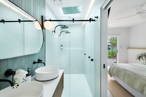 Ensuite with a generous his and hers shower. 