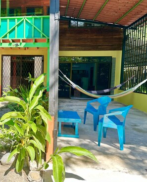 Hang out area with chairs and hammocks.