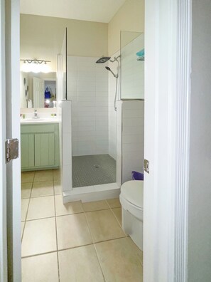 NEW walk in shower with rainfall shower head. 