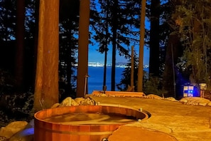 A night-time dip in the cedar hot tub is just what you need to relax and rejuvenate!