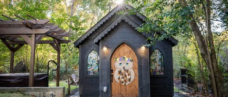 The Owl Creek chapel, nestled in a cozy wooded area with privacy and serenity.