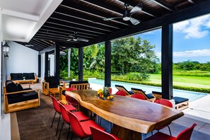 Enjoy delicious meals with a stunning pool view!