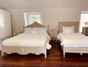Two beds, one queen-sized and one twin-sized. Comfortably sleeps 3 guests