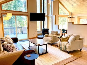 Main floor living room, lake-facing windows