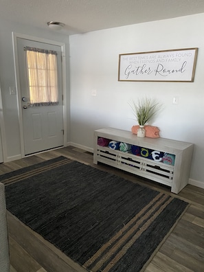 Inviting entrance where you can kick off your shoes and relax upon arrival.