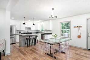 Full kitchen and dining area