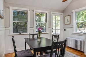 Enjoy a relaxing breakfast in the kitchen with views of the backyard and patio