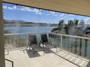 Lakeside view from deck with misters. 