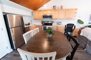 Kitchen and dining table with modern appliances