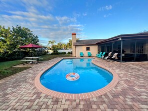 Heated pool 6 ft deep with pool chairs and patio umbrella 