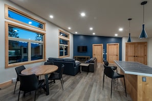 Living dining area. TV, fireplace. Spacious and wheelchair accessible.