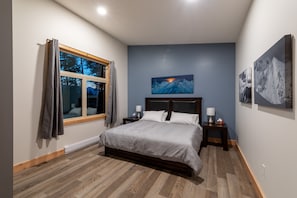 Master Bedroom - Spacious, wheelchair accessible and mountain views. King Bed.