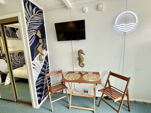 Dining area with Roku TV