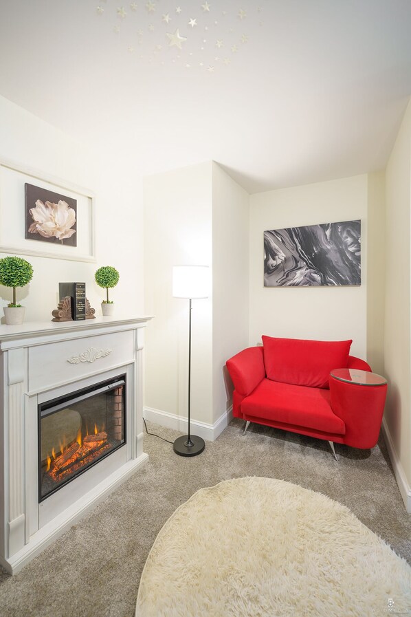 Relax & read a book by the fire!