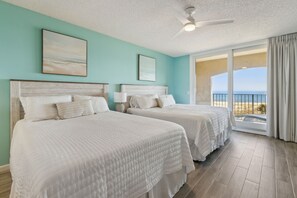 Bedroom 2 with Beautiful Oceanfront Views, Private Balcony, Wet Bar Area with Mini Fridge, and a Flat Screen TV (King Bed and Queen Bed)
