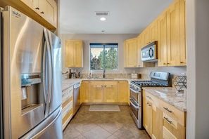 Fully Equipped Kitchen with Stainless Steel Appliances