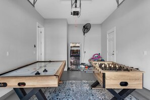 Rainy day at the beach? No problem....Emerald Escape has your day covered in this garage game room!!