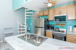 Kitchen with eat in bar