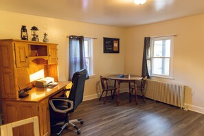 Office With Office desk And Printer At Main Entrance