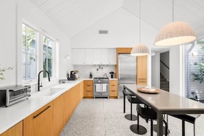 State-of-the-Art Kitchen - Equipped with blender, Keurig coffee machine, lots of cookware, and enough dishes and dining utensils for everyone.