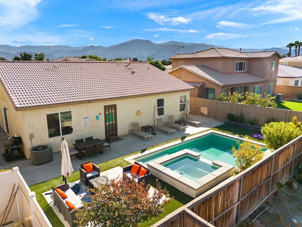 Upper view of the jacuzzi, pool and fire pit!