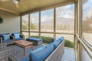 Relax on the screened in porch