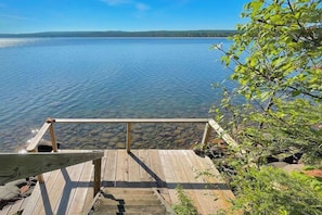 Imagine sitting here, just steps above the lake, enjoying a good book or a glass of wine...or just the sound of the waves.