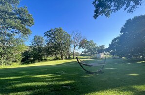 Over 1 acre lot which overlooks a nearby pond