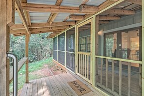 A screened front porch allows you to sit outside any time of the year
