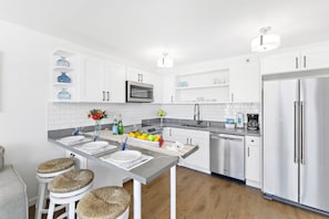 Fully equipped kitchen perfect for your culinary needs with dishwasher