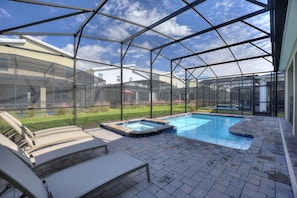 Enjoy the outdoor loungers and spa