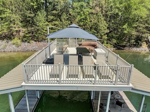 Party dock with seating for 15 people and water toys.