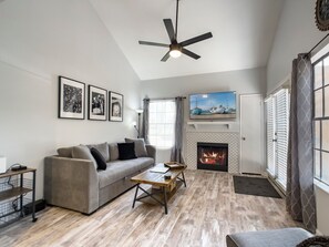 Large vaulted ceilings, a 55 inch TV and a clean comfortable space to relax!  