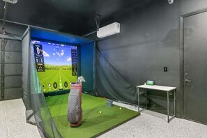 Challenge your friends to a round of golf on the Golf Simulator!