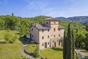 The main Villa with 3 housing units inside and the surrounding lawn