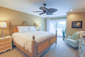 The master suite has a private balcony overlooking the golf course.