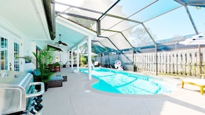 This large pool and lounge area with patio furnishings are perfect for enjoying time in the Florida sun with family and friends.