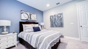 Bedroom on the main floor. Queen size Bed. 
