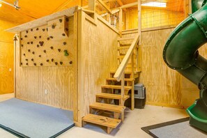 A challenging but fun rock wall is just one feature of the indoor play space designed specially for kids!A challenging but fun rock wall is just one feature of the indoor play space designed specially for kids!