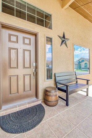 Front porch bench and table to enjoy the front yard