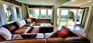 Oceanfront breezes through the sliding glass door leading to expansive deck!