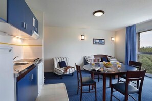 Tuck into a great meal in your dining area.