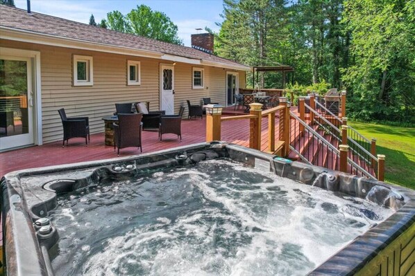 Enjoy the Hot Tub and Gas Fire Pit on this expansive deck