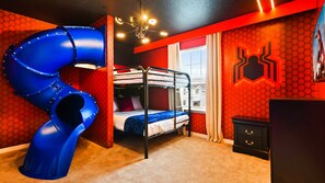 Kids will love the upstairs bedroom with a cool Spider-man theme